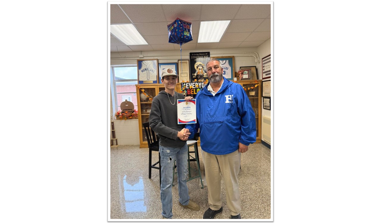 Brian Hensley, our high school Student of the Month for November, is pictured with his assistant principal.