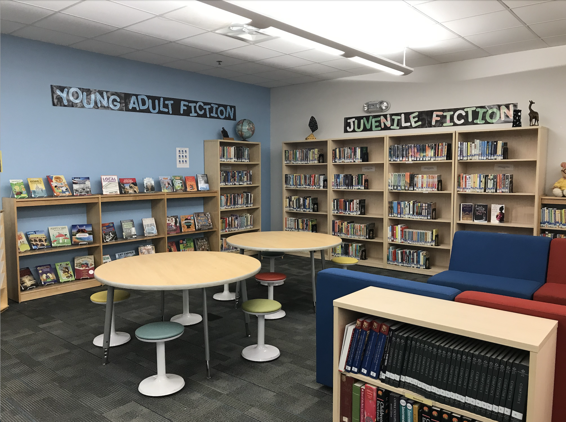 Learning Commons new arrivals section, young adult and juvenile fiction, flexible seating areas