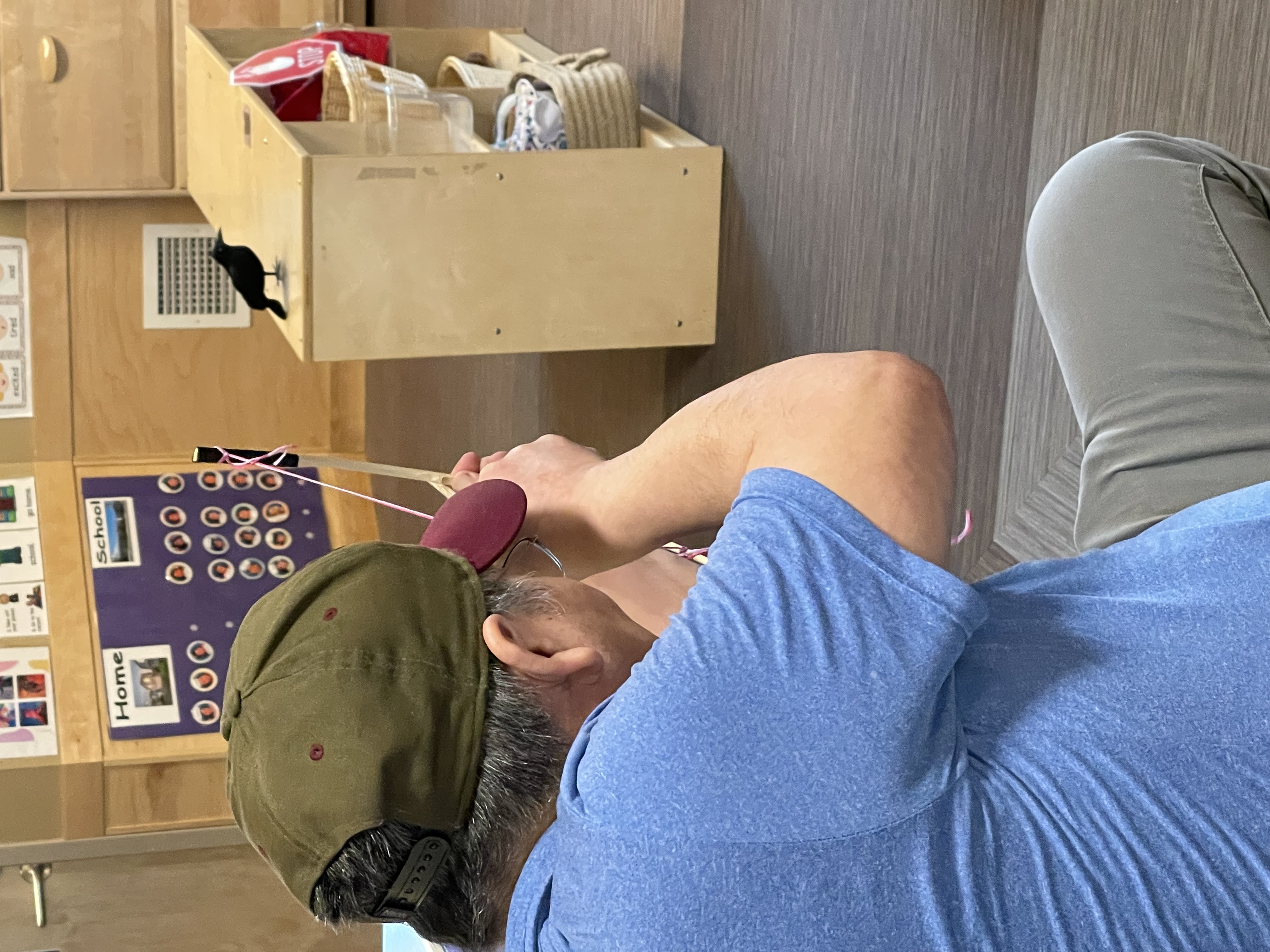 staff aiming at bird