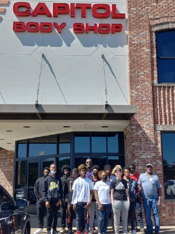 Collision Repair students touring the body shop in Jackson, MS