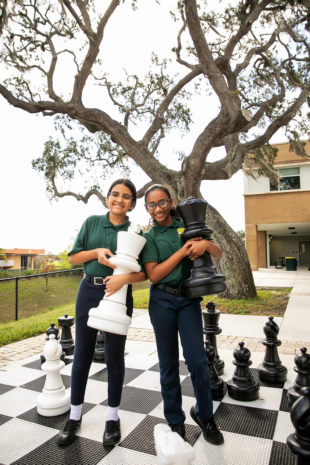 Girls with Chess Pieces