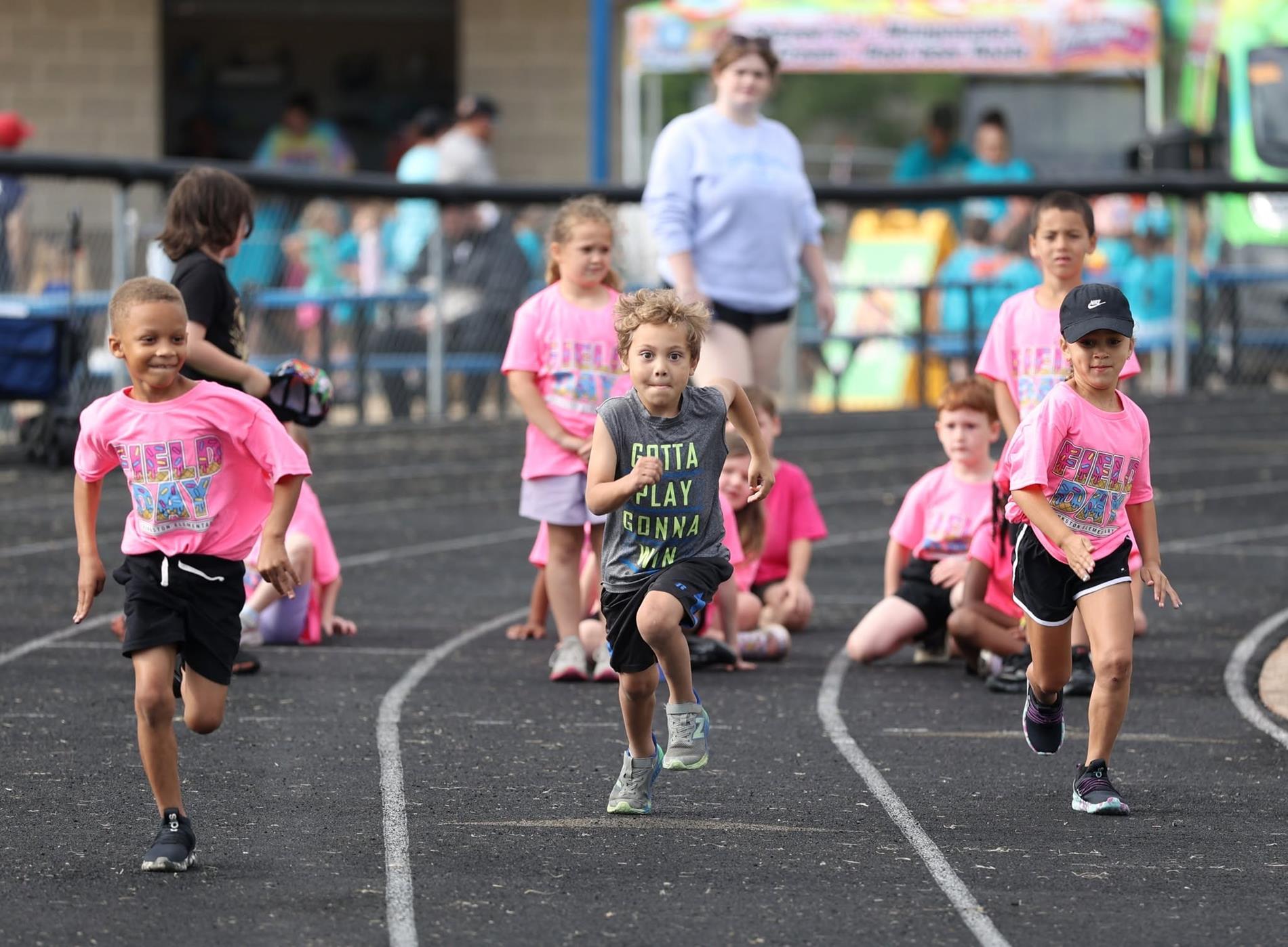elementary children running a race