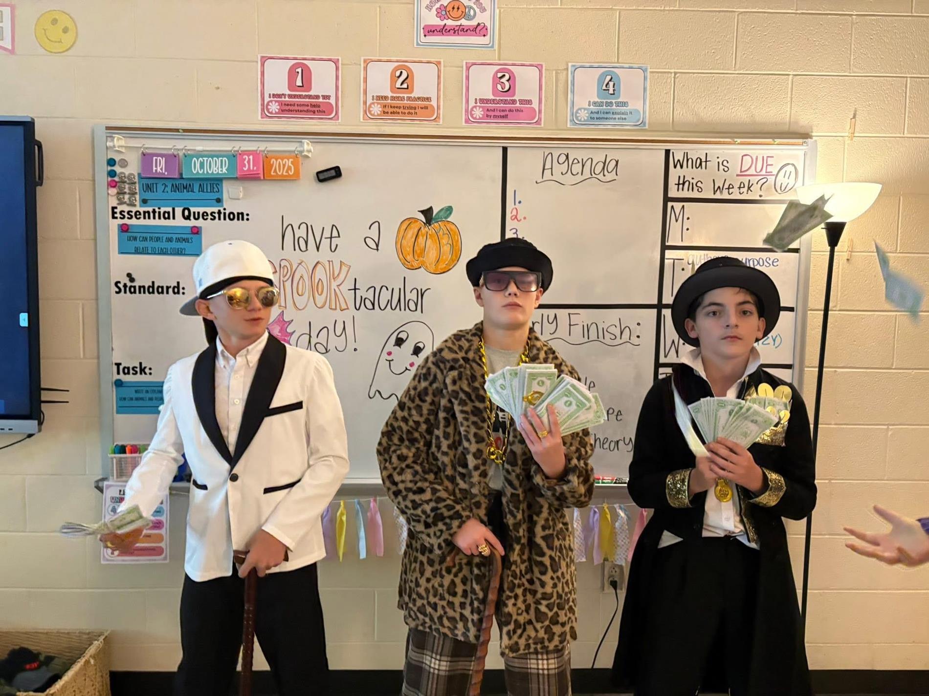 6th grade boys dressed for Halloween.