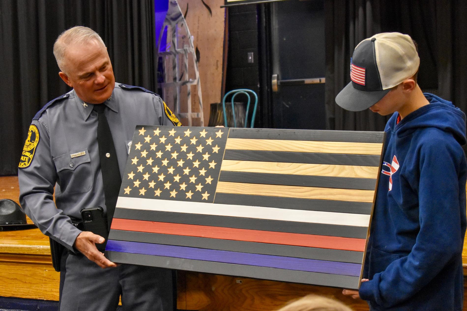 Building and Trades Present Flag to Colonel Gary Settle