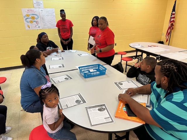 Photos of Parents and Staff at literacy night conversing.