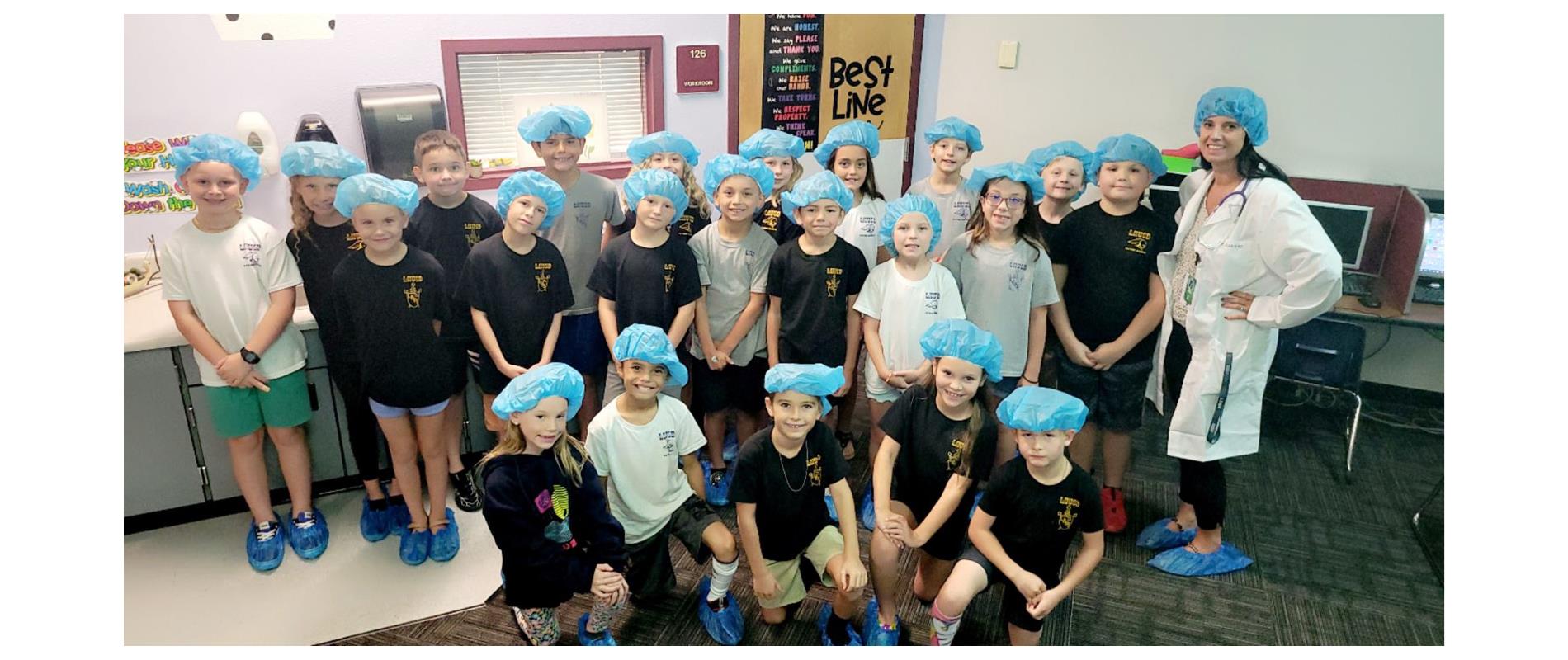 Mrs. Hammer's class dresses as doctors while studying the human body