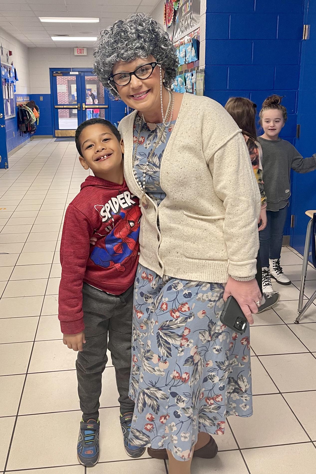 Principal and student on 100th day