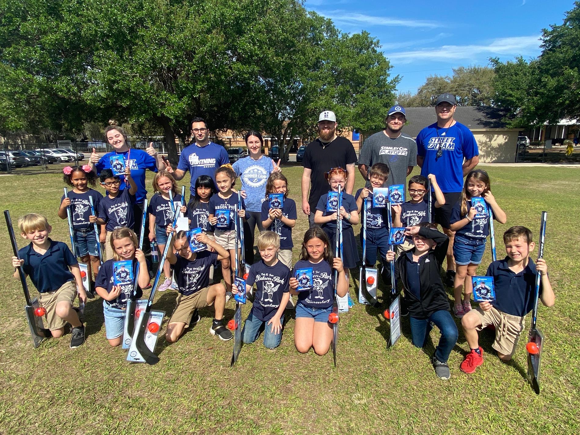 2nd grade students with the Street Hockey Team