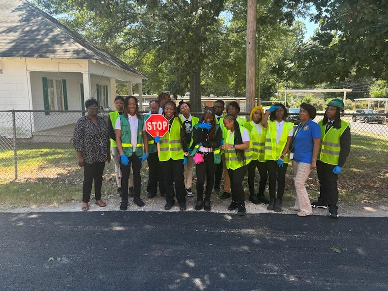 Law & Public Safety & Educator Prep Doing Community Service Cleaning the Campus of HSHS/Juniors and Seniors Community Service