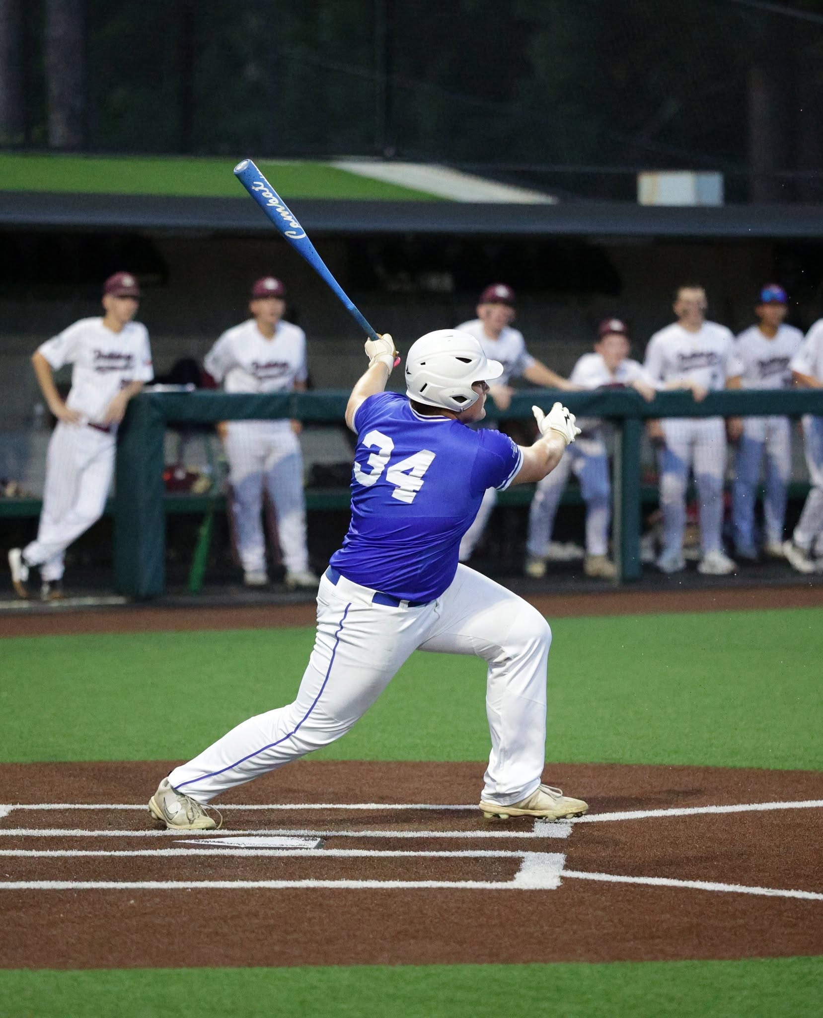 baseball player swinging