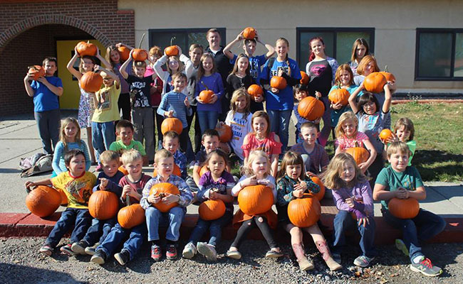 kids with pumpkins