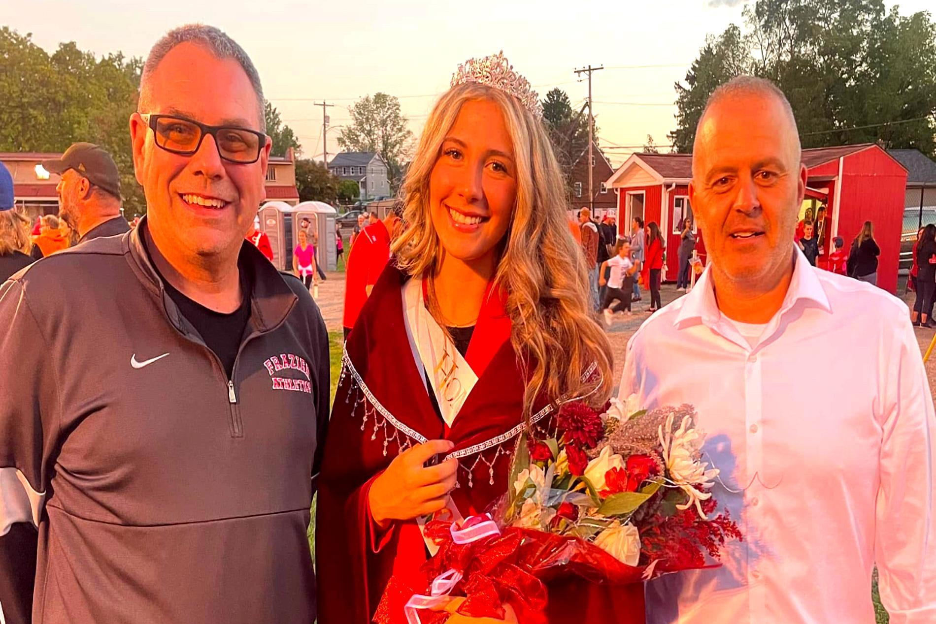 Homecoming Queen Grace Vaughn pictured with Mr. Turek and Mr. Pappas