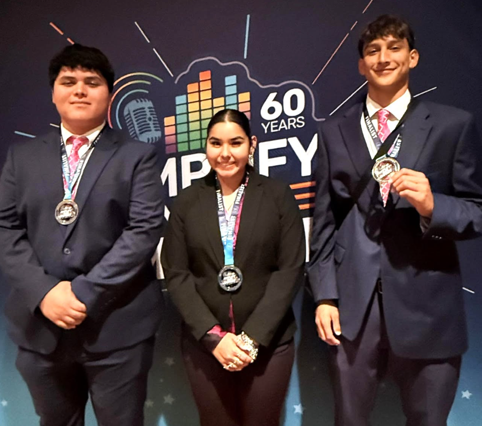 3 high school students with their BPA awards