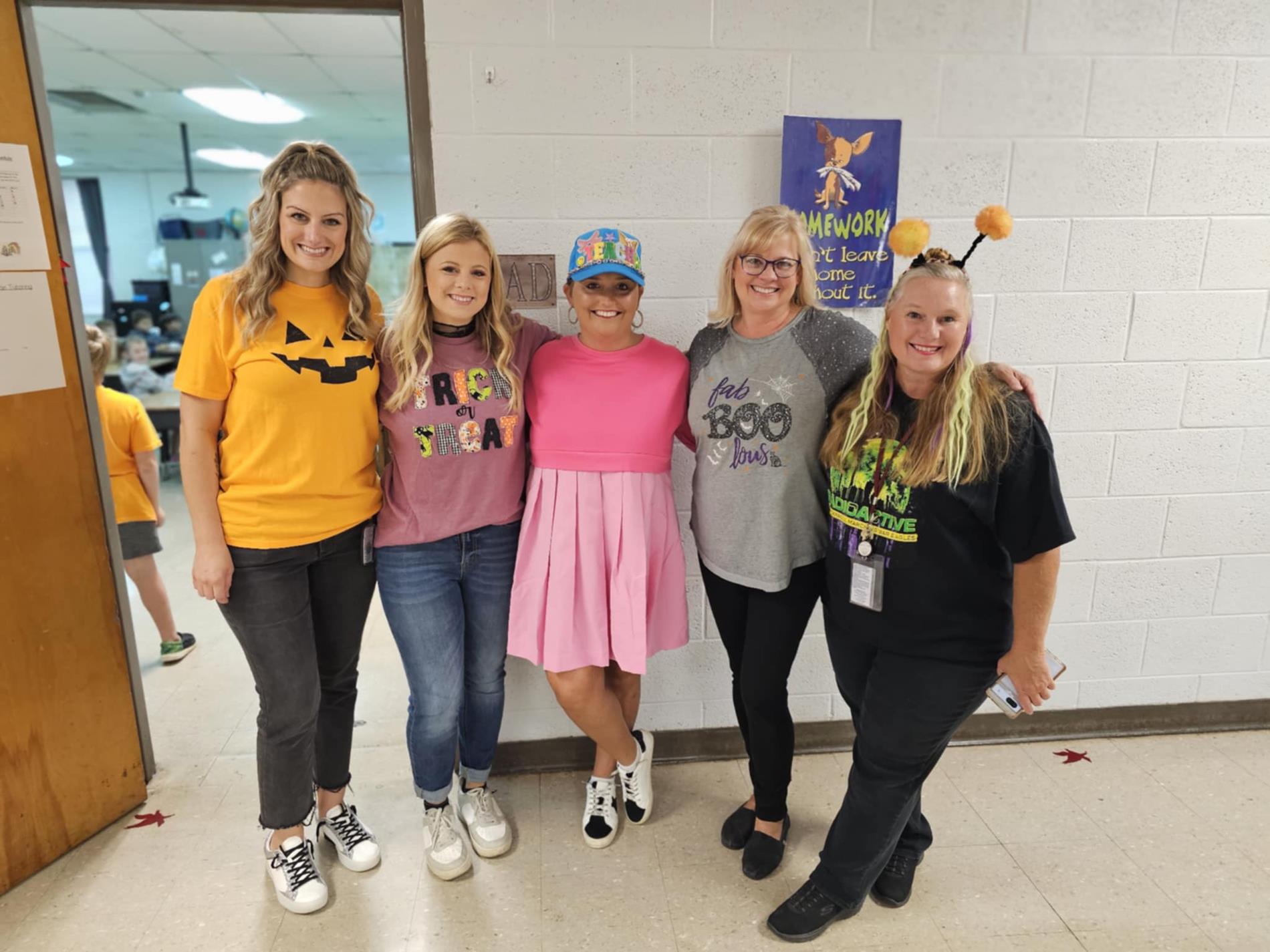 WCP teachers prepping for Trunk or Treat in gym