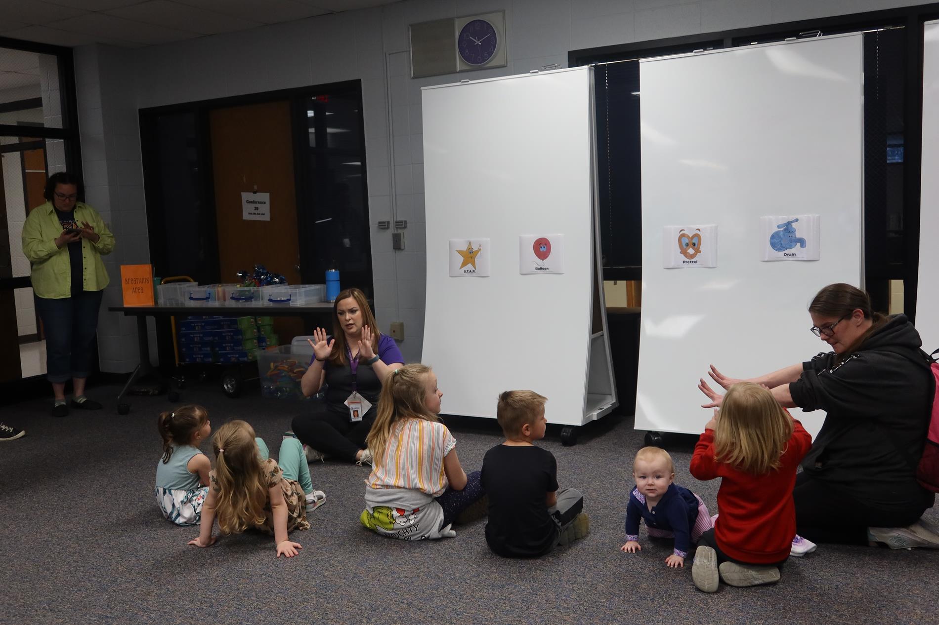 Rebecca tells a story at our birth to five event