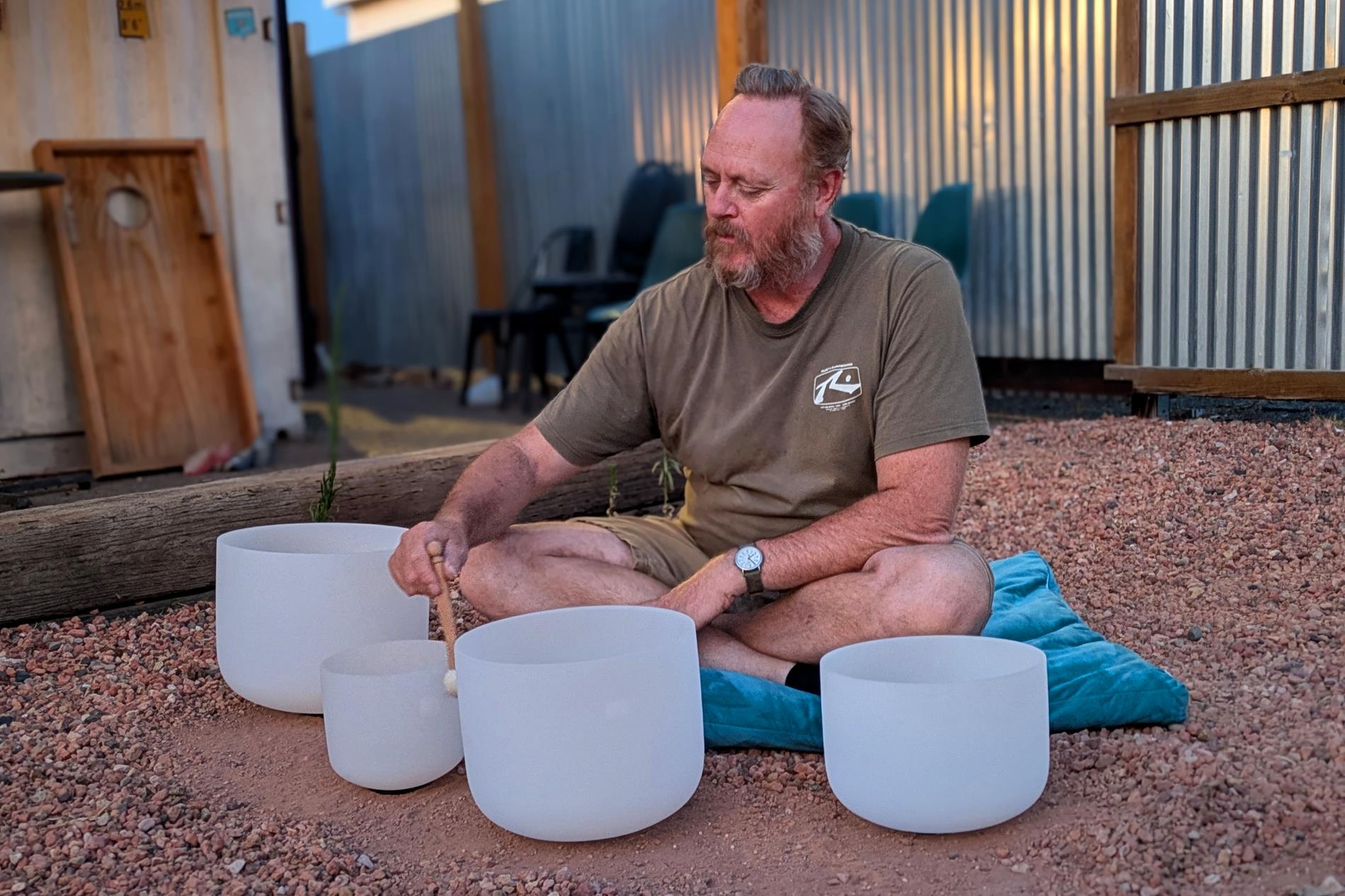 Steven playing crystal singing bowls