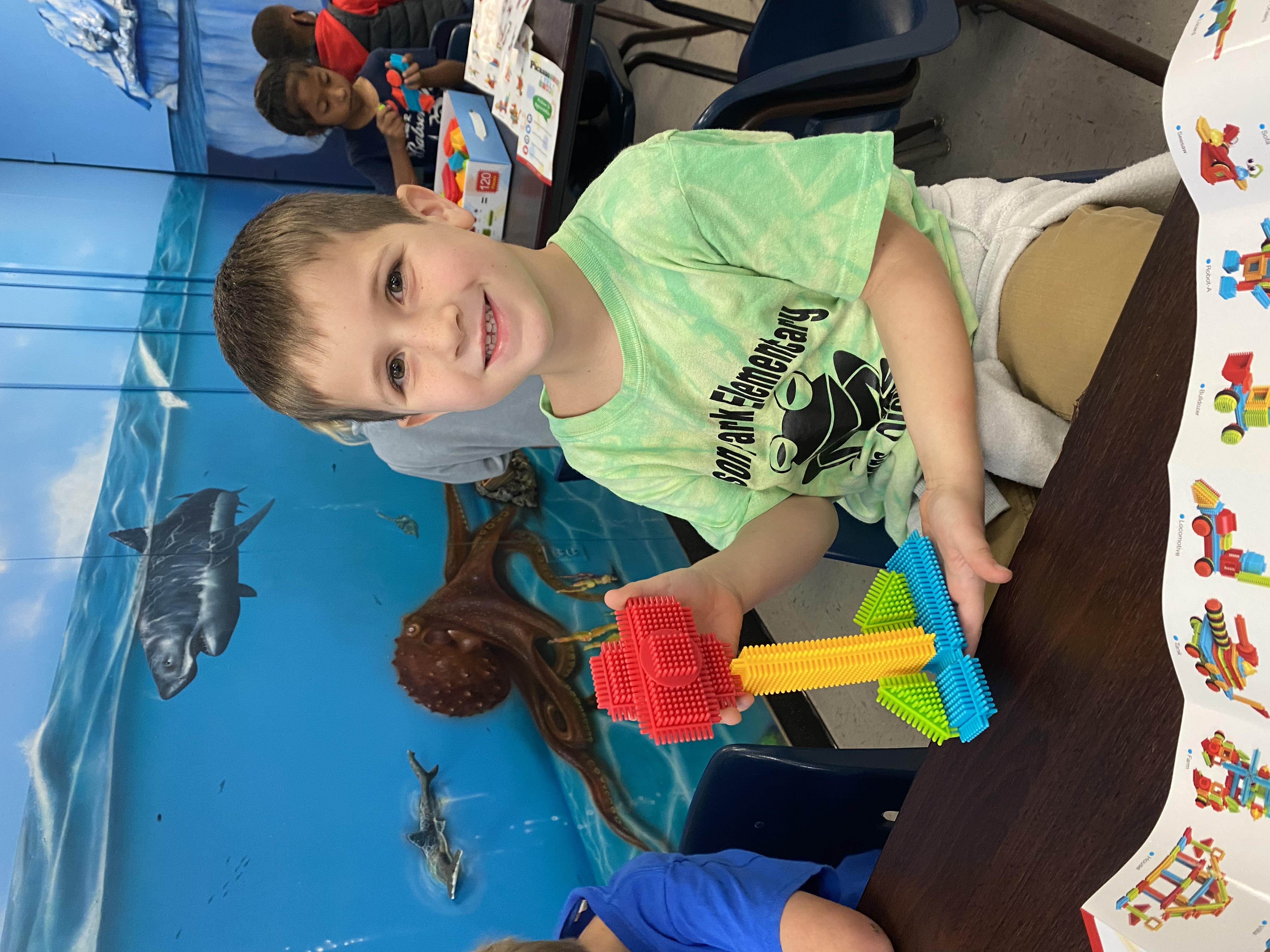Kindergarten students exploring how to be an engineer with Bristle toys.