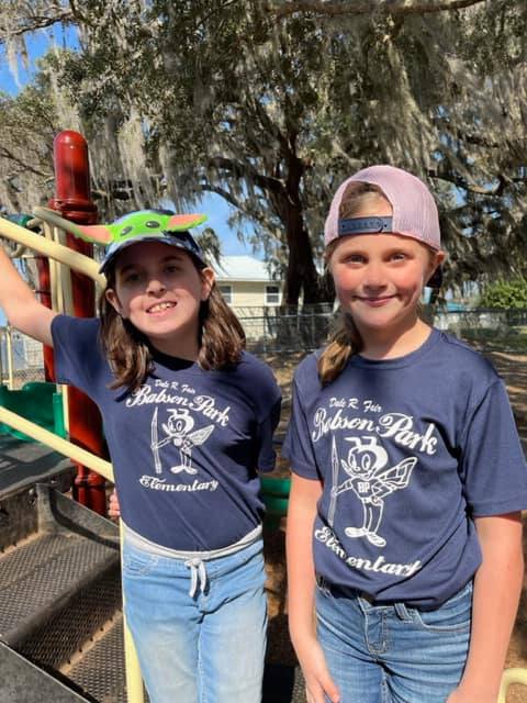 Gnats wearing hats to celebrate Hats Off To Reading on our first day of Literacy Week.