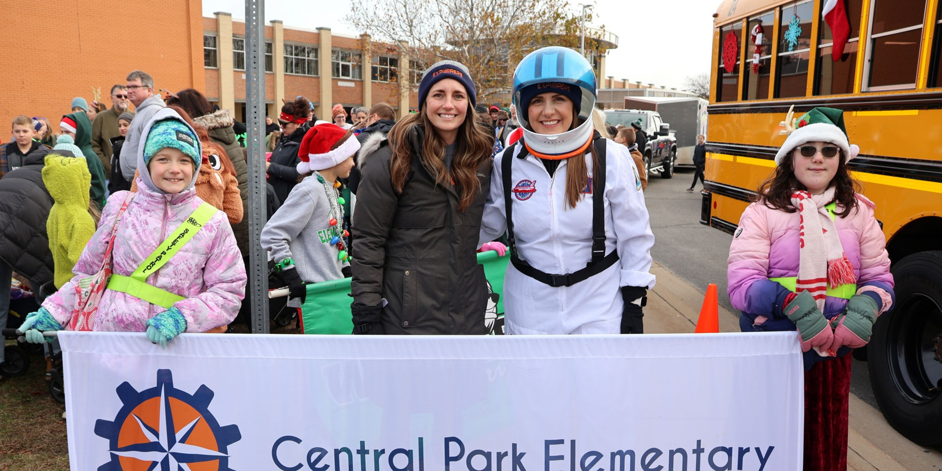 Principals at CPE posing with students