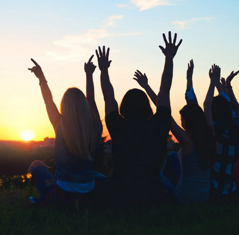 Youth with hands raised Youth with hands raised