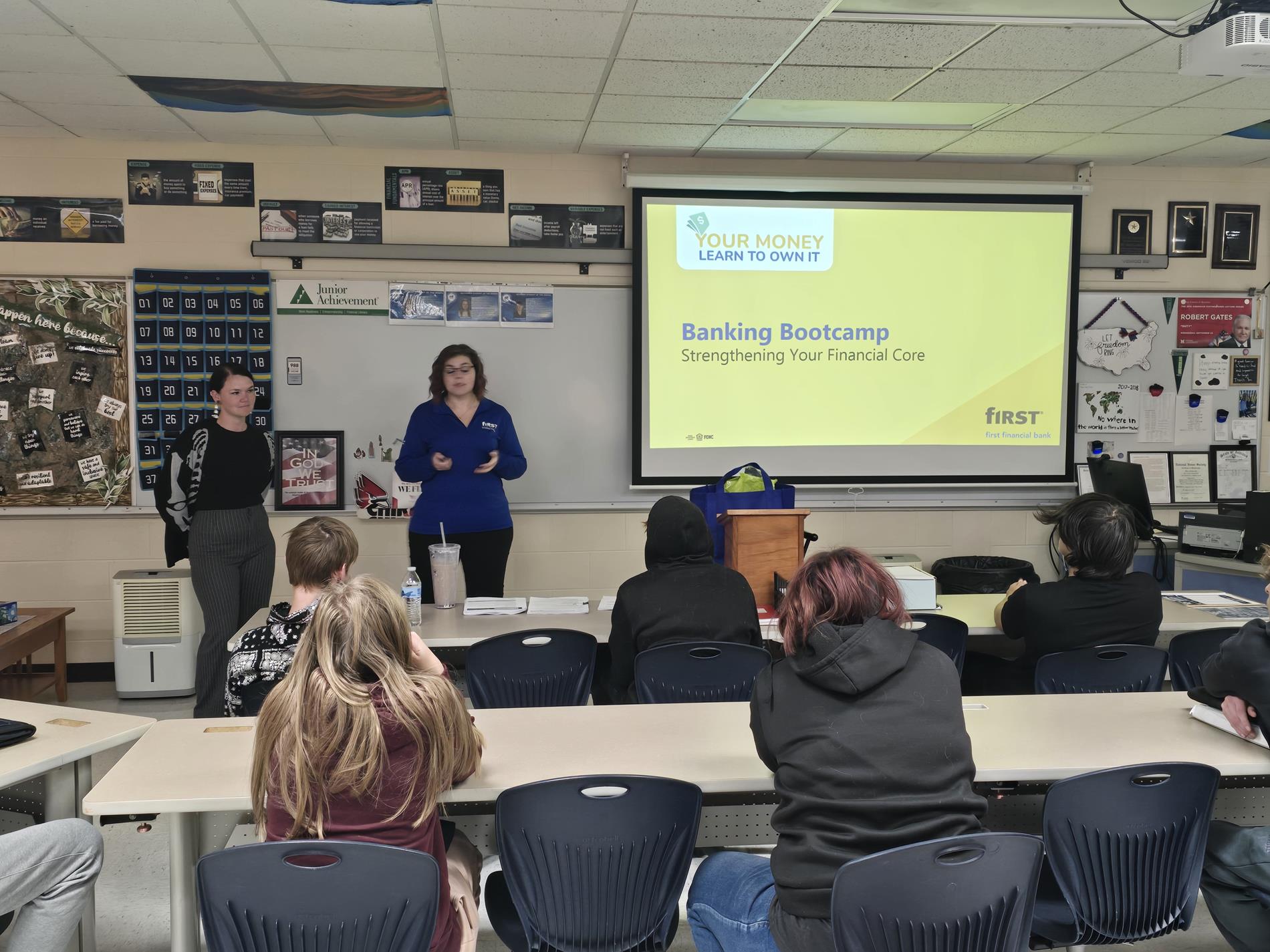 High school students listening to First Financial bank presentation.