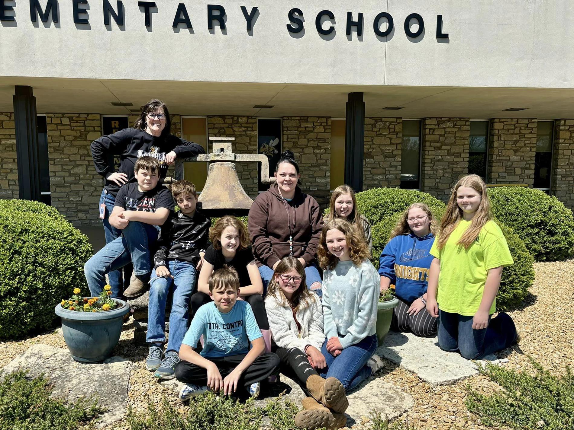 Student Council Members in front of the school 