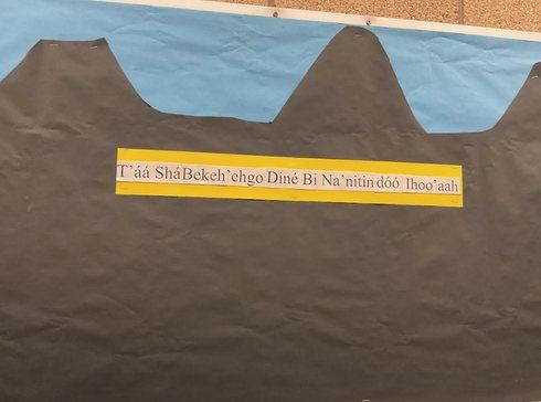A classroom board displaying Navajo language teaching