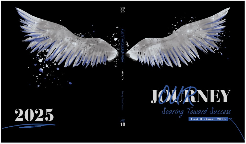 This year's yearbook cover: a set of white wings above the title "Our Journey: Soaring Towards Success" East Hickman 2025