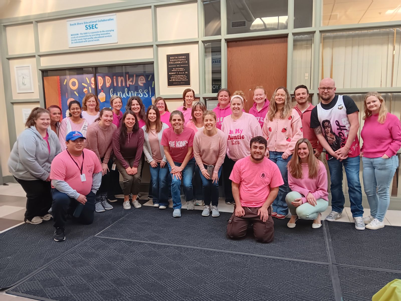 Picture of staff wearing pink shirts