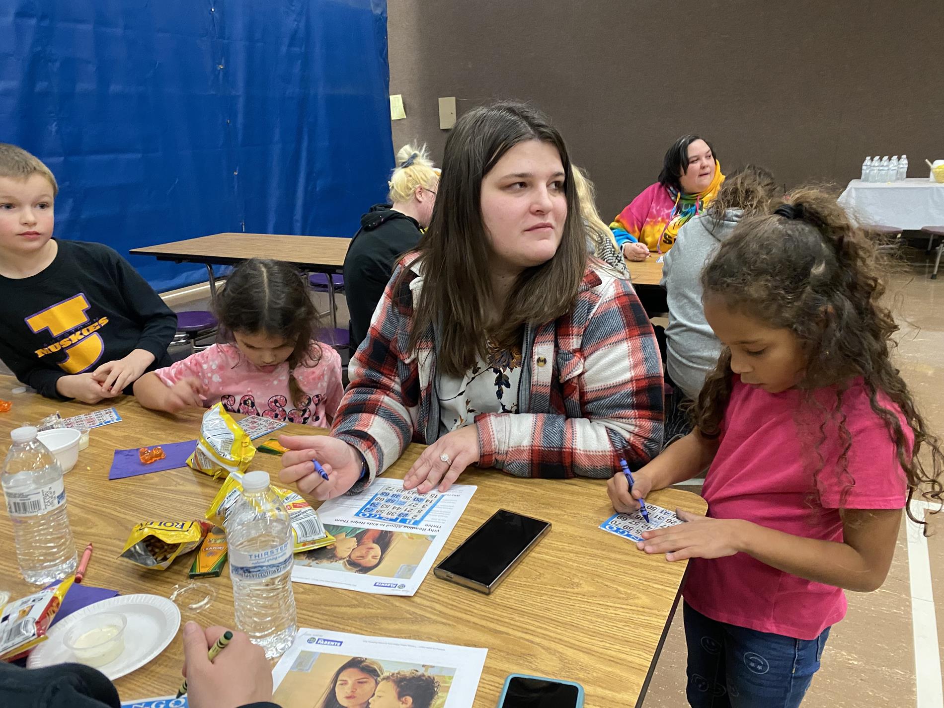 Family playing Bingo, Girl, Boy, Adult
