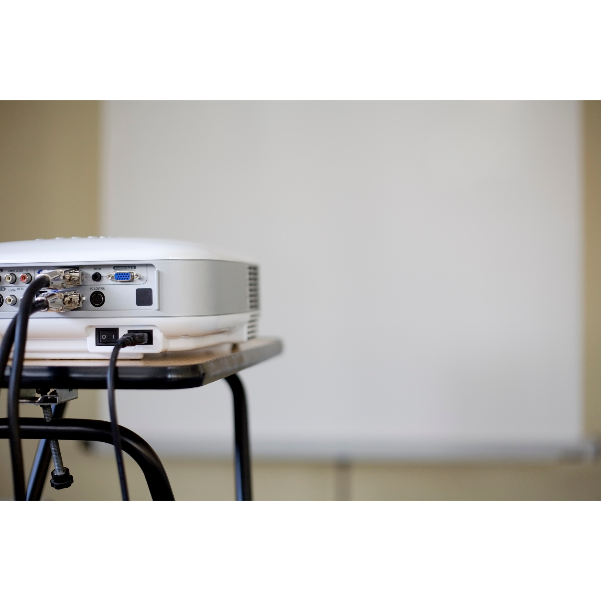 image of a projector projecting on wall image of a projector projecting on wall