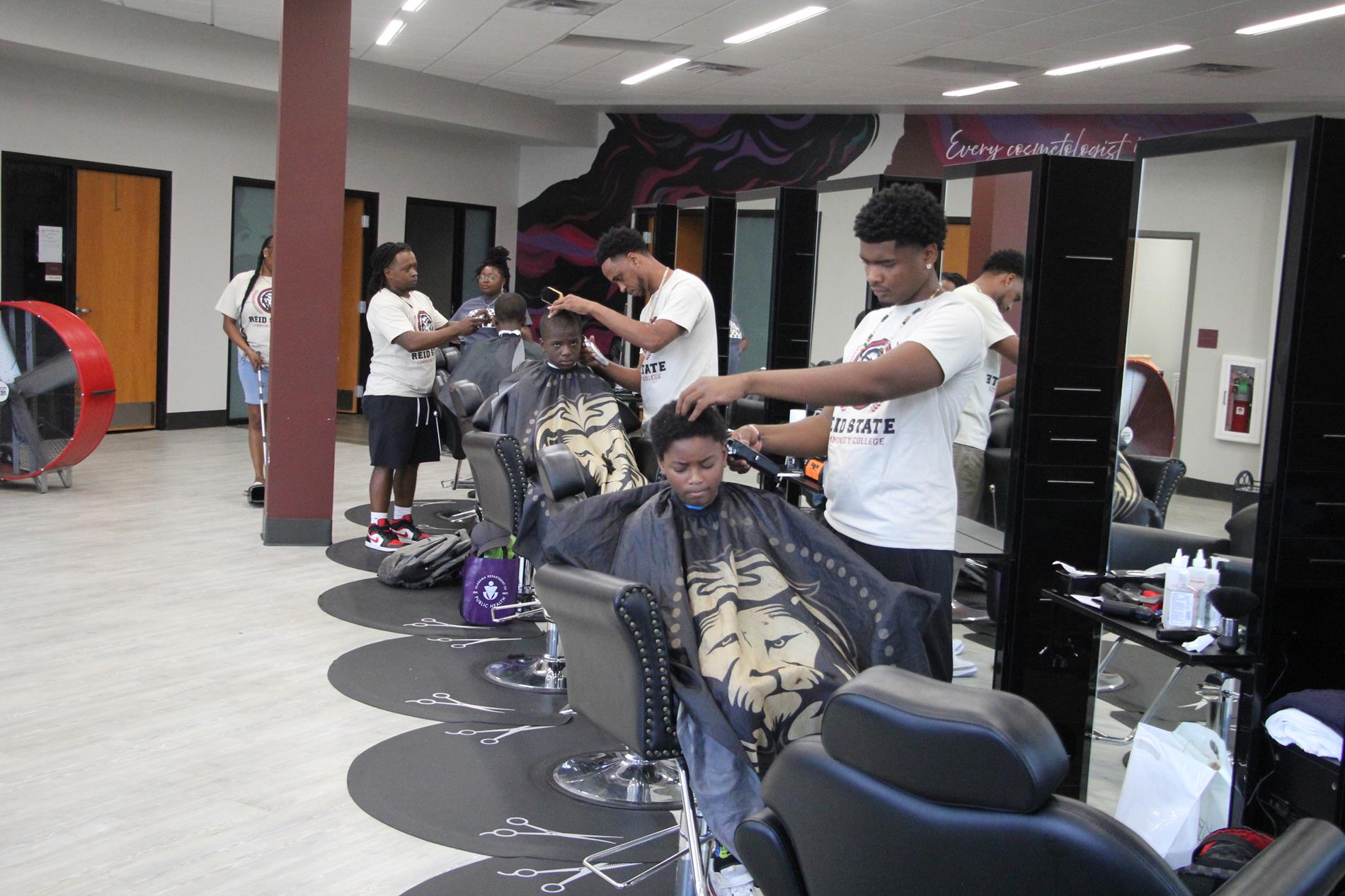Reid State Students Give Haircuts at the Back to School Bash