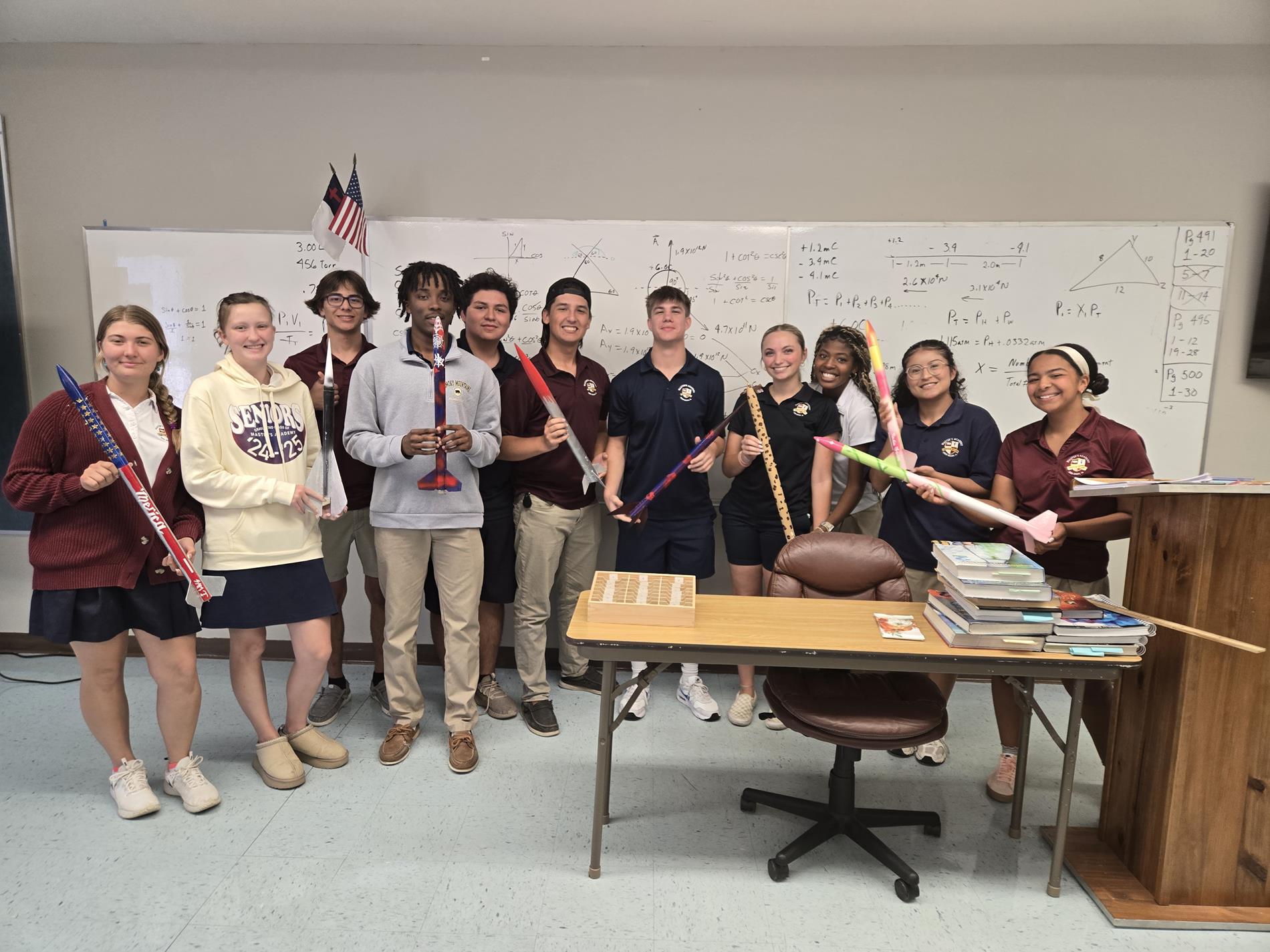 STEM students posing in classroom 