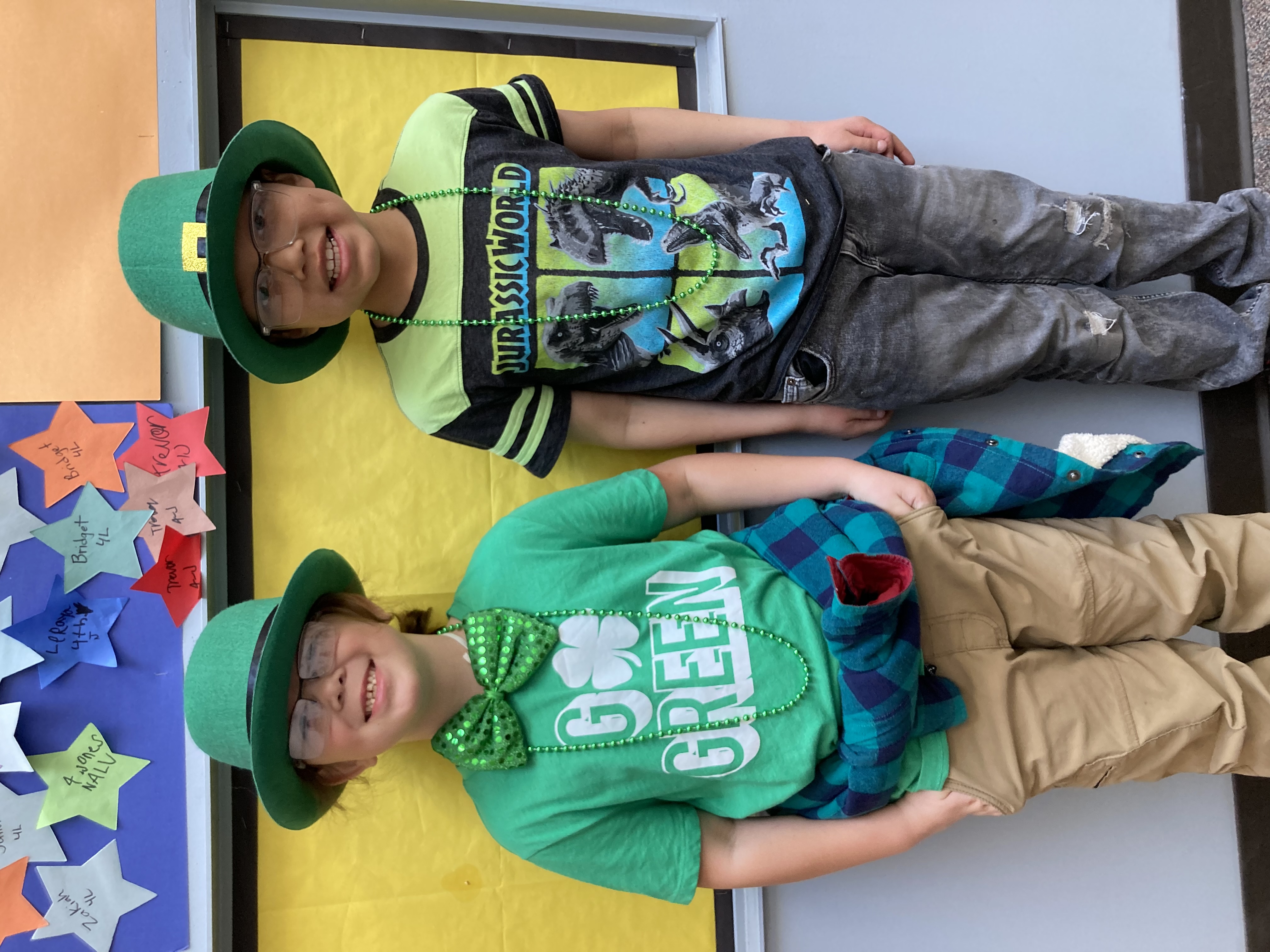 2 Elementary Students wearing Leprechaun hats