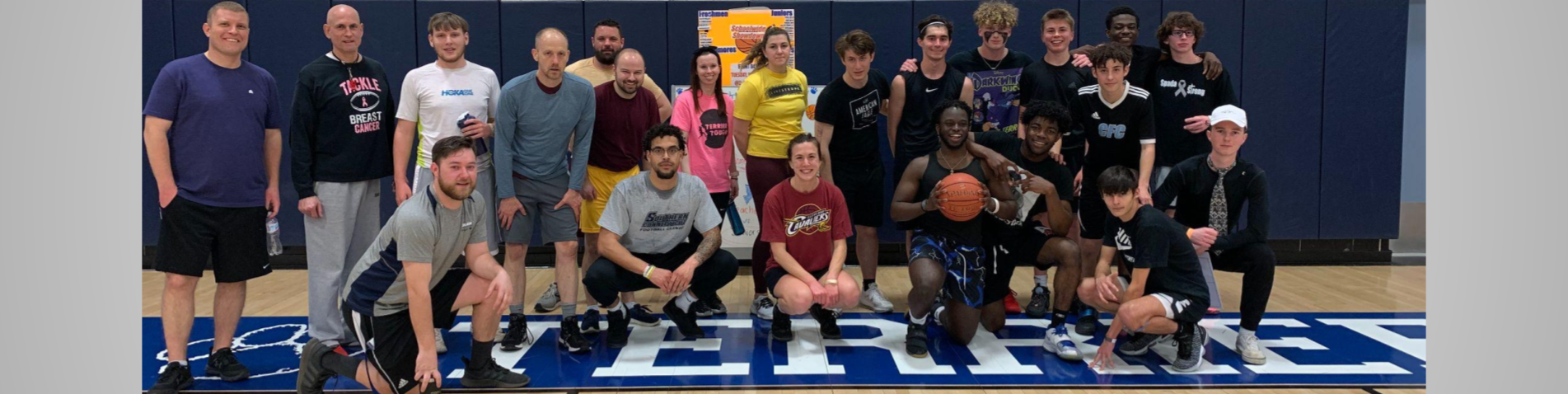 Student-staff photo after basketball game