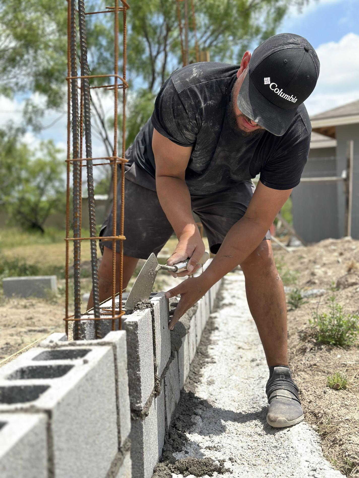 person building a wall