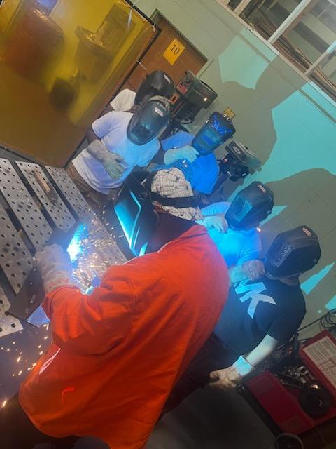 Welders working in the welding shop