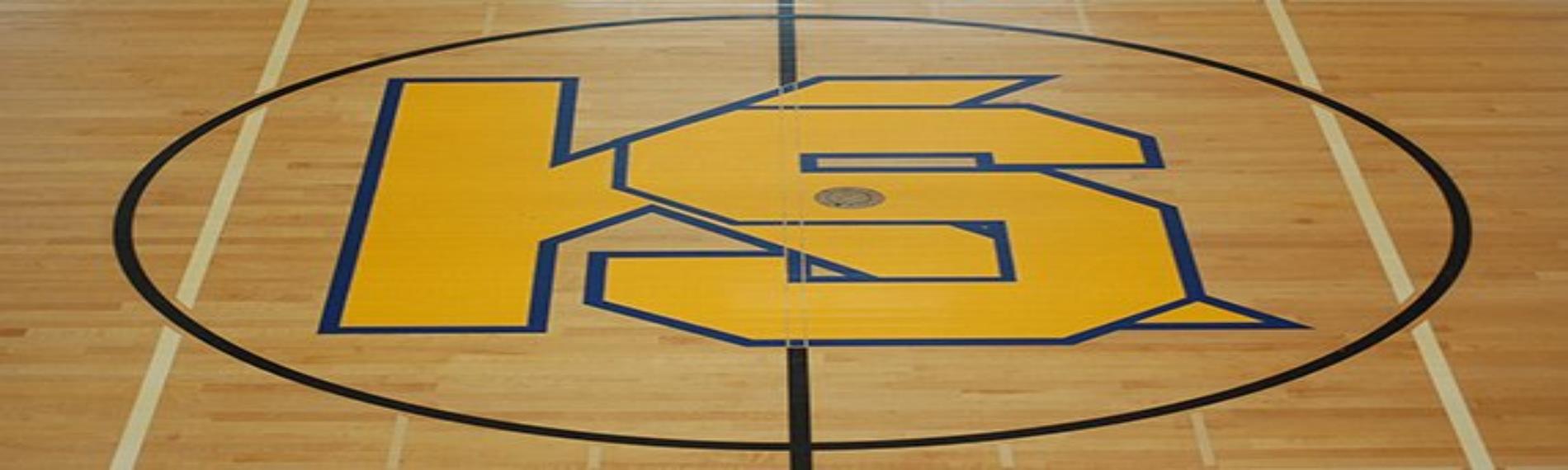 logo on the center of the basketball court