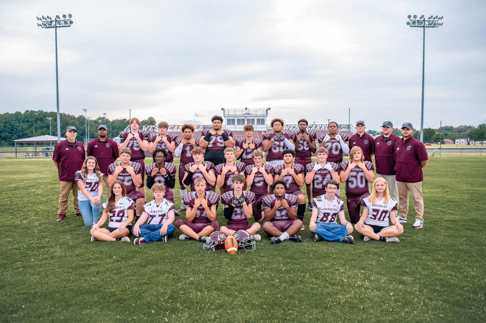 HS Football team with coaches