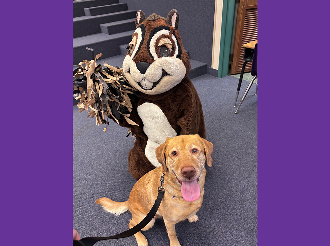Showing Twitch our One Book One School Character along with our Emotional Support Dog Winnie