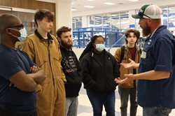 Student's learn about job opportunities available in plumbing