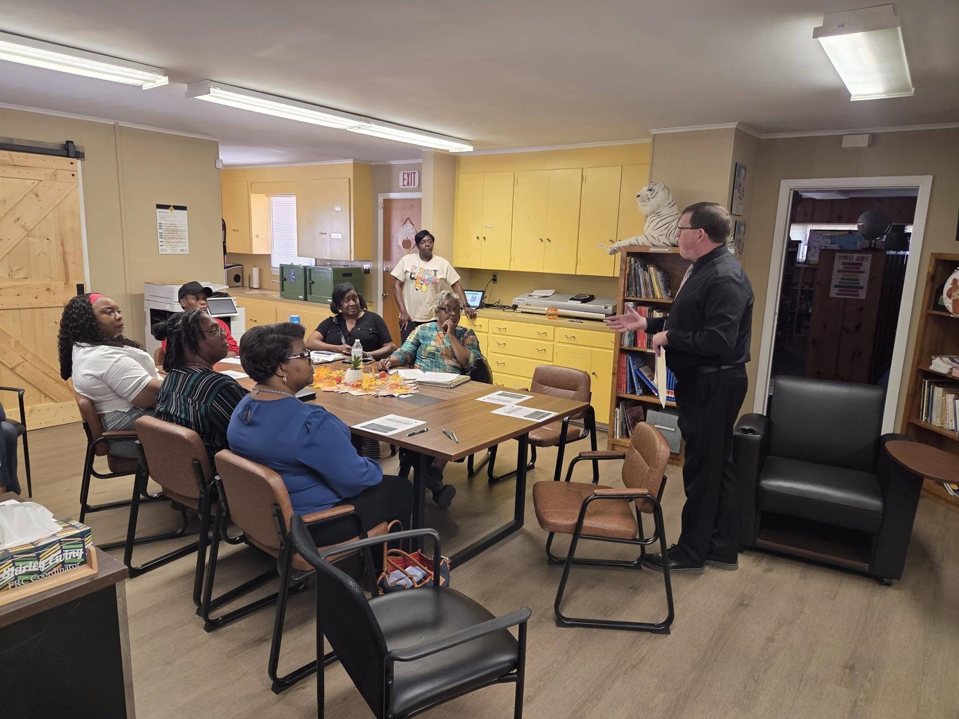 WPCSD parents, community members, and staff listen to a presenter during the Annual Title I Parent Meeting at the WP Family Resource Center.
