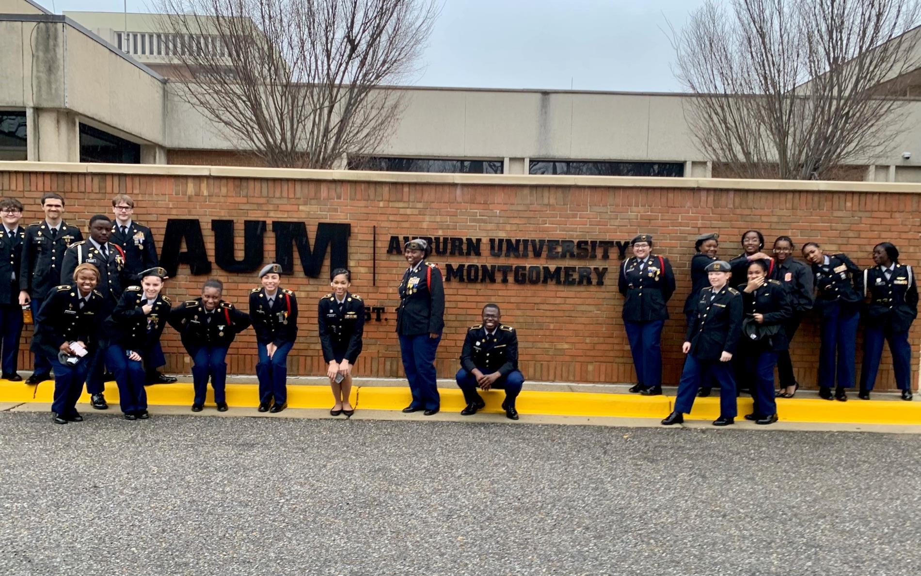 : Murphy and Blount JROTC cadets pose for a photo after receiving a tour of AUM campus by the ROTC Mustang Battalion in Montgomery, Alabama.