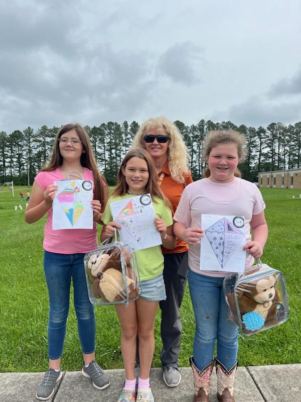 Kite designer winners-Lyllah Harris, Lanell Reavley, Linda Wood, pictured with Ms Tammy from AWARE. 