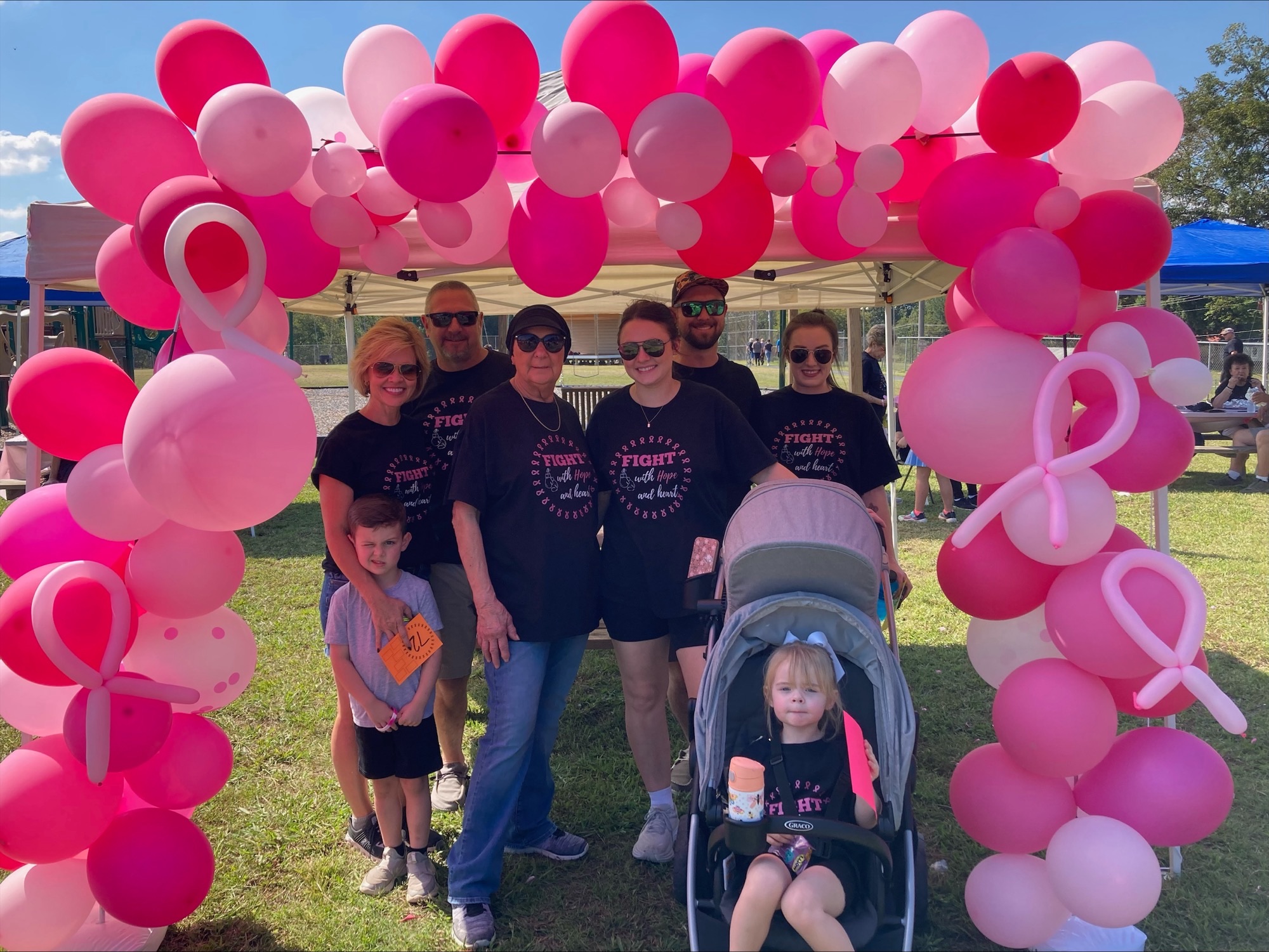 Ms. Hope poses with her family before the Walk for Hope