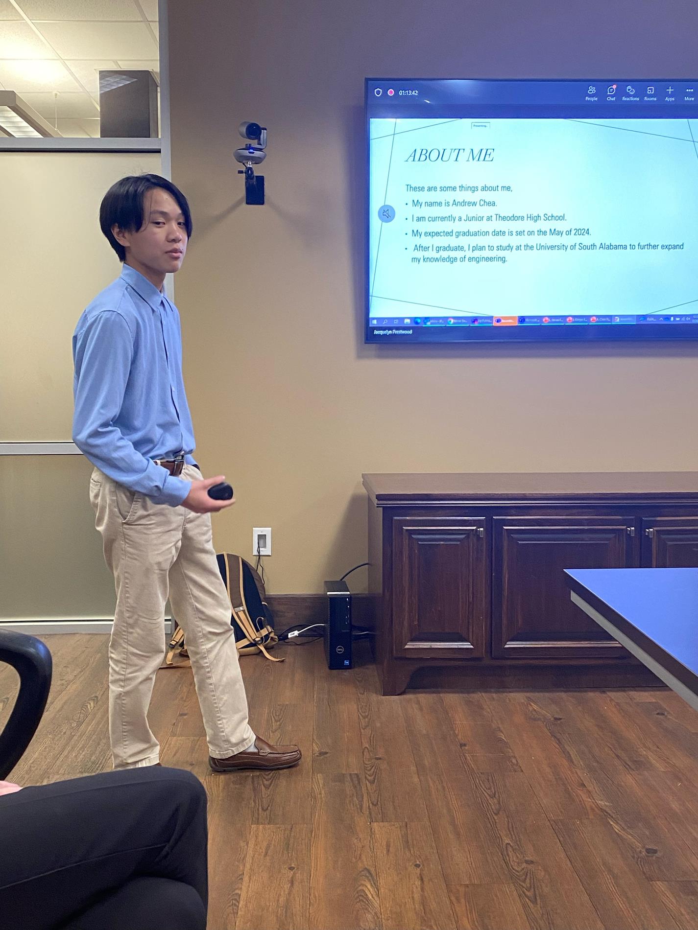 Andrew Chea presenting at Hargrove Engineering where he interned this summer. 