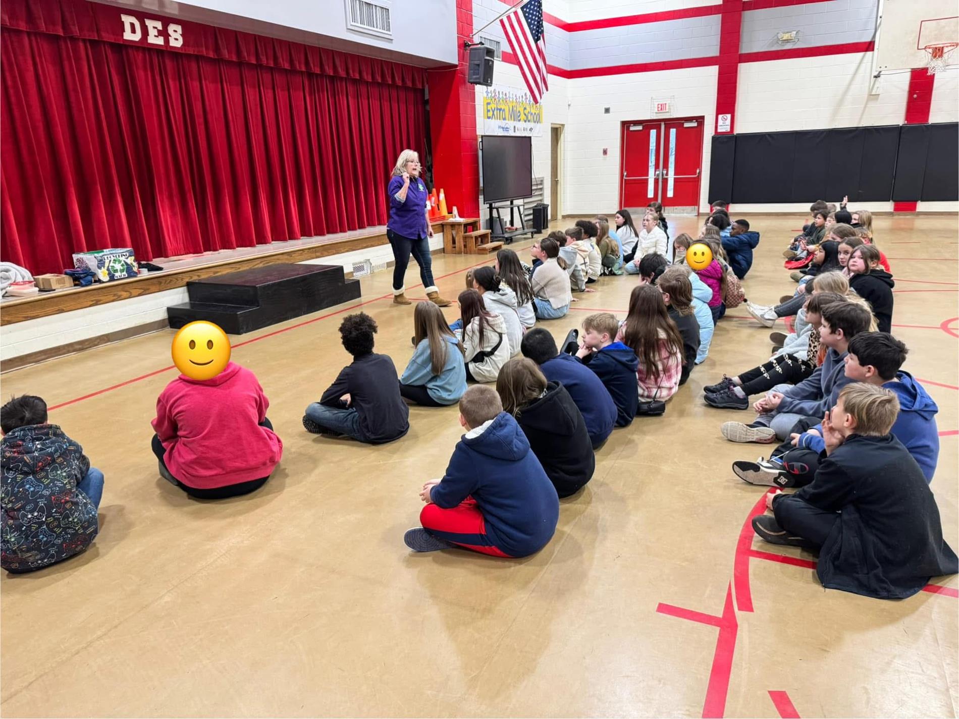 students sitting down in auditorium 