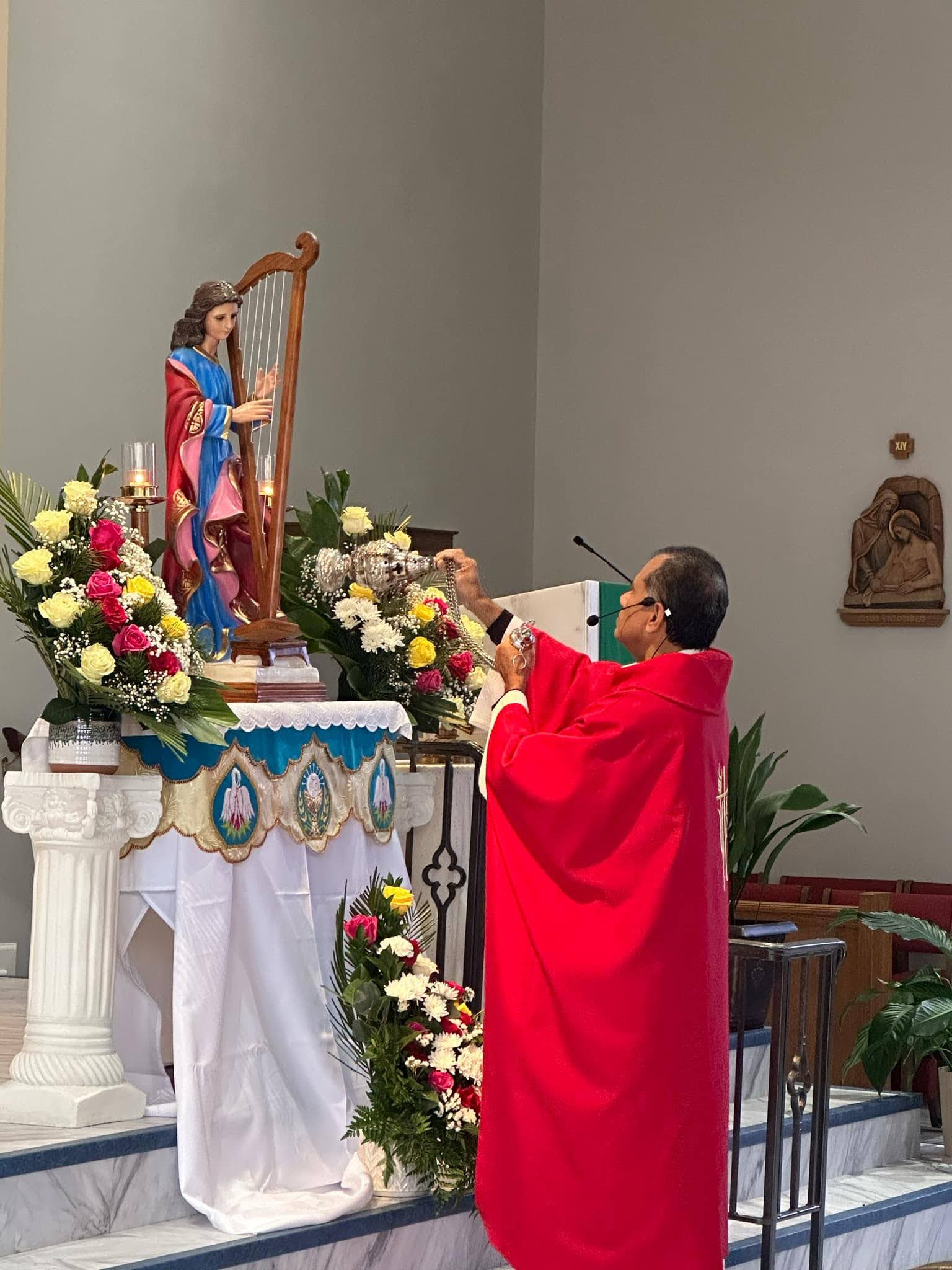 Father Antony incenses at the shrine of St. Cecilia