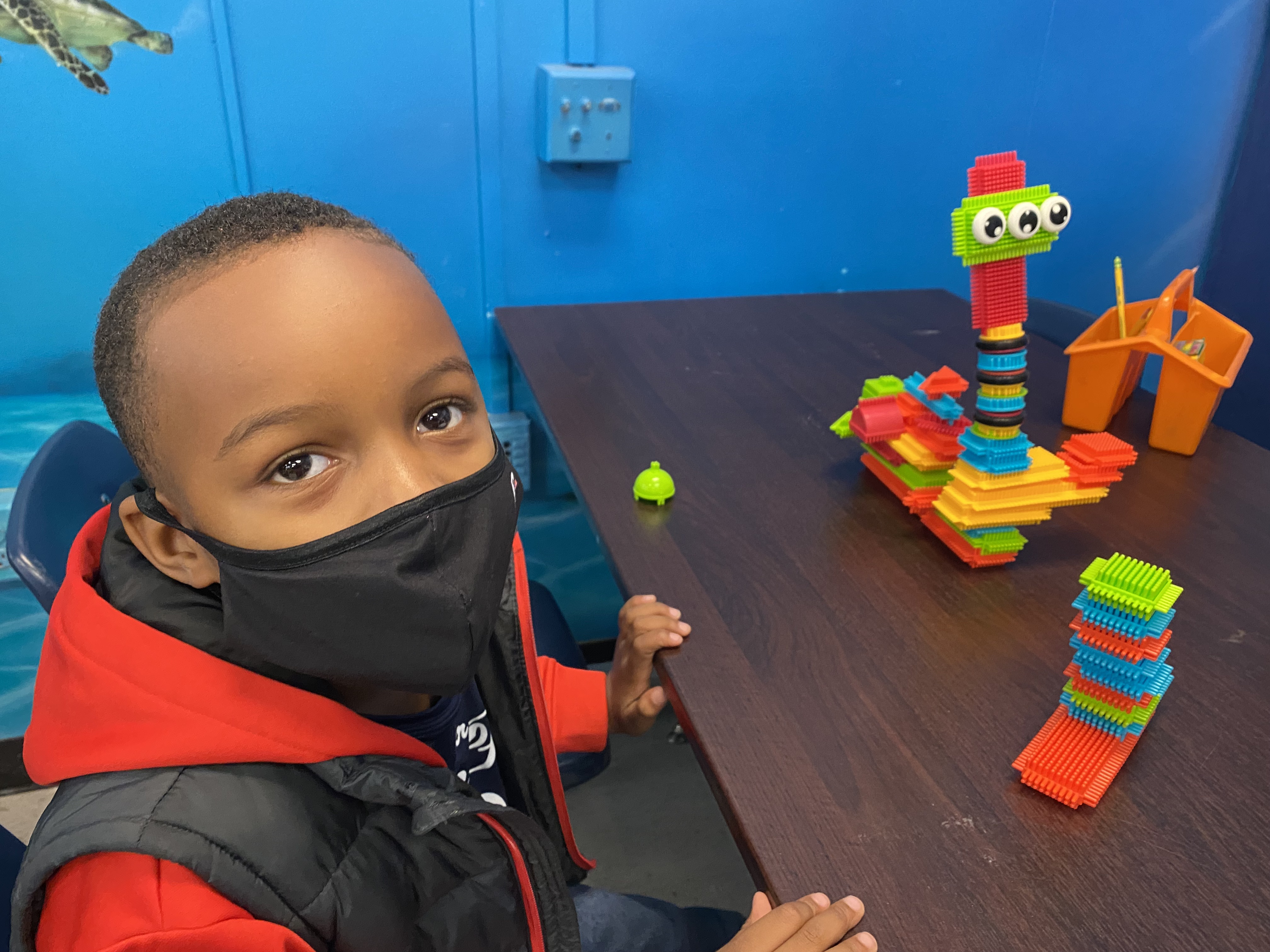 Kindergarten students exploring how to be an engineer with Bristle toys.
