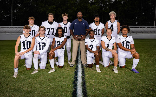 Football seniors and coach davis